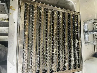 Grease filters before cleaning